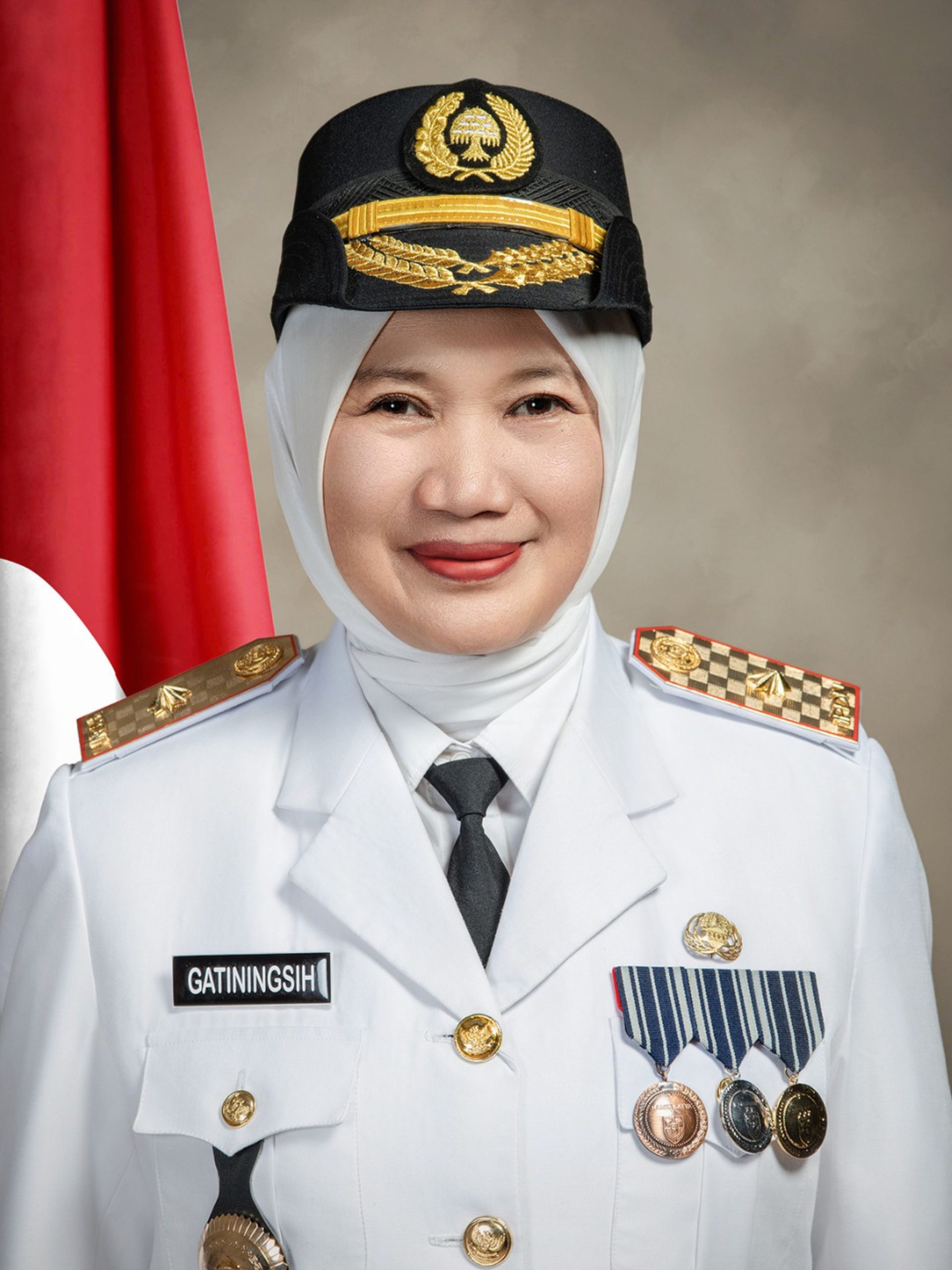 Dr. Dra. Gatiningsih, MT